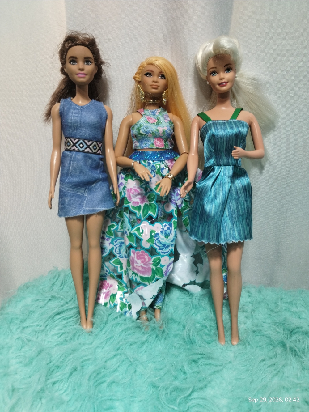 Barbie Dolls Lot with Blue, Teal, Green and Floral Dresses